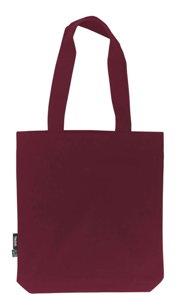 Dunkelroter Stoff-Einkaufstasche mit langen Henkeln und Fairtrade-Label